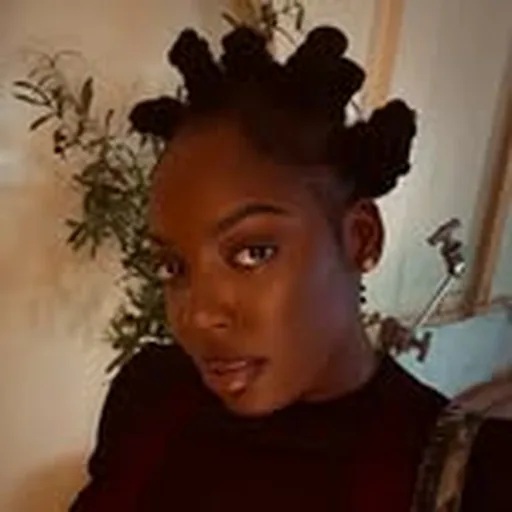 @realqueenizzy profile image